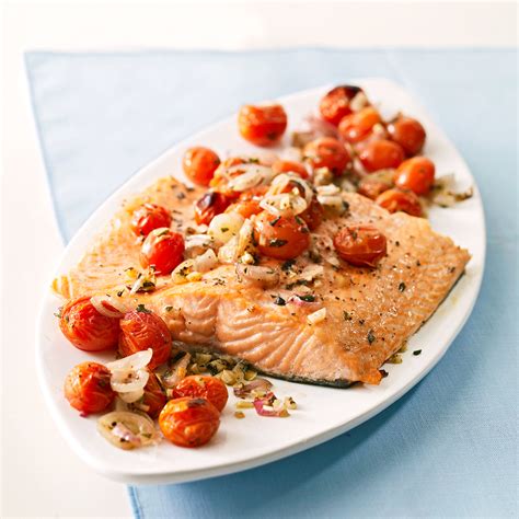salmon-with-roasted-tomatoes-and-shallots-eatingwell image