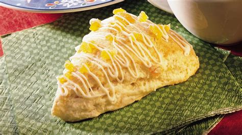 apricot-scones-with-white-chocolate-drizzle image