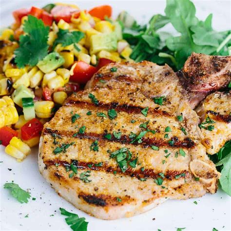 grilled-pork-chops-with-corn-salad-jessica-gavin image