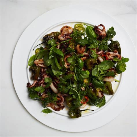 charred-padrn-chiles-and-squid-salad image
