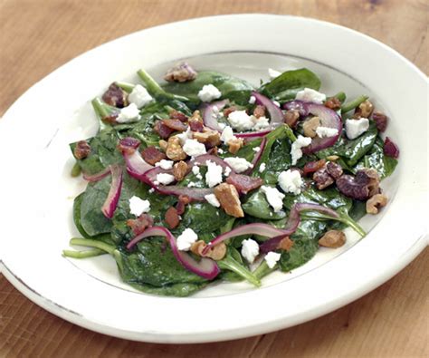 warm-spinach-salad-with-bacon-walnuts-goat-cheese image