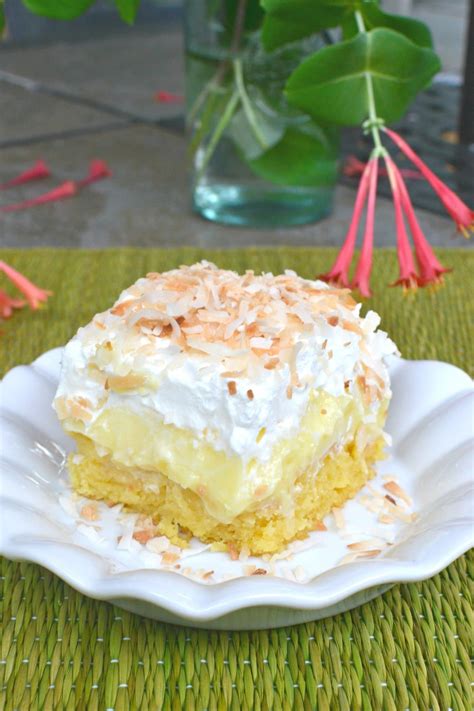 pineapple-coconut-poke-cake-a-southern-soul image