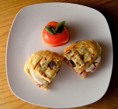 panini-prosciutto-mozzarella-tomato-and-basil image