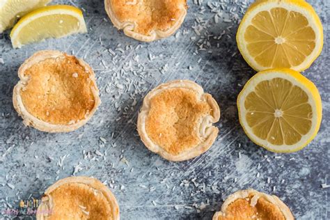lemon-coconut-tarts-tastes-of-homemade image