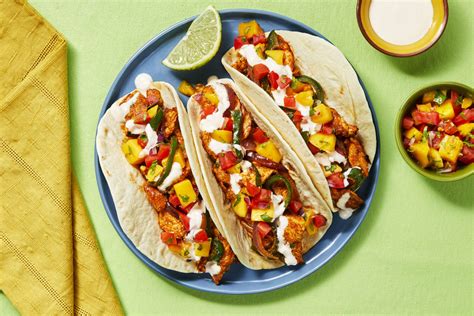 mango-tango-chicken-tacos-recipe-hellofresh image