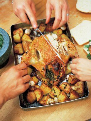 roast-chicken-with-lemon-rosemary-roast-potatoes image