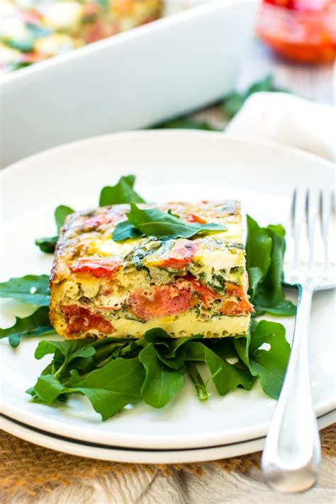 baked-frittata-with-pesto-tomatoes-goat-cheese image
