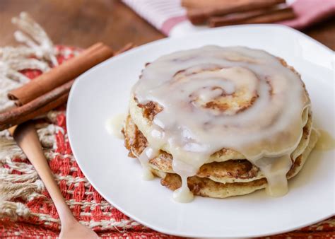 cinnamon-roll-pancakes-with-cream-cheese-frosting image