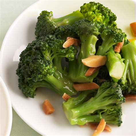 tangy-broccoli-with-almonds-eatingwell image