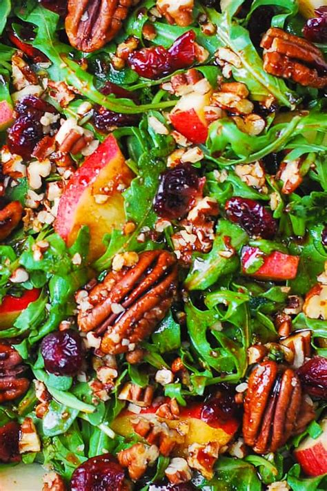 arugula-salad-with-apples-cranberries-and-pecans image