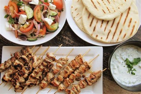 chicken-souvlaki-with-tzatziki-sauce-and-greek-salad image
