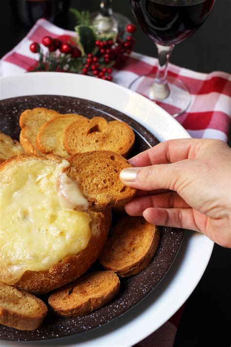 brie-baked-in-a-bread-bowl-is-a-must-make-good-cheap image