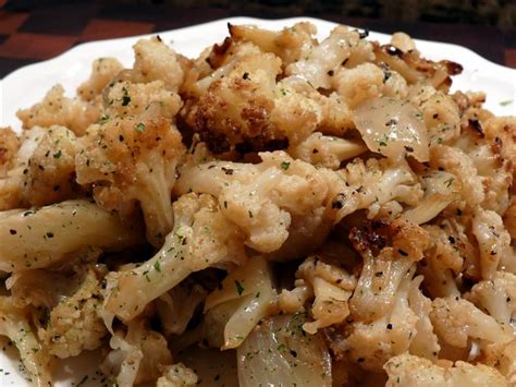 oven-roasted-cauliflower-onions-and-garlic-a-tasty image