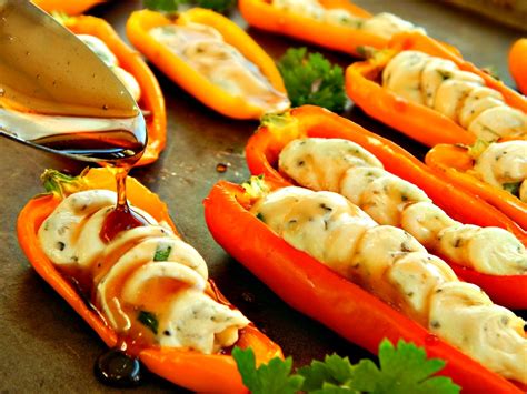 mini-peppers-stuffed-with-herbed-goat-cheese image