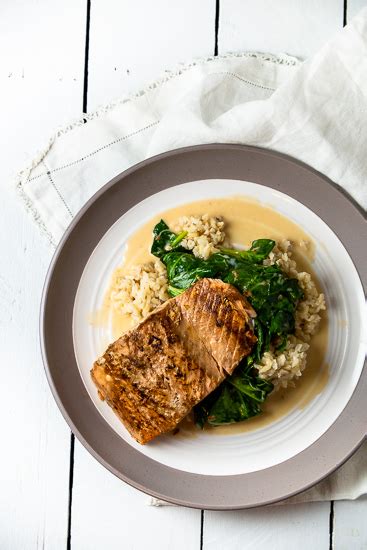 seared-salmon-on-coconut-spinach-sidewalk-shoes image