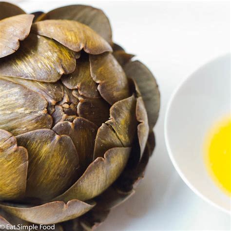 steamed-artichoke-and-lemon-butter-dipping-sauce-eat image