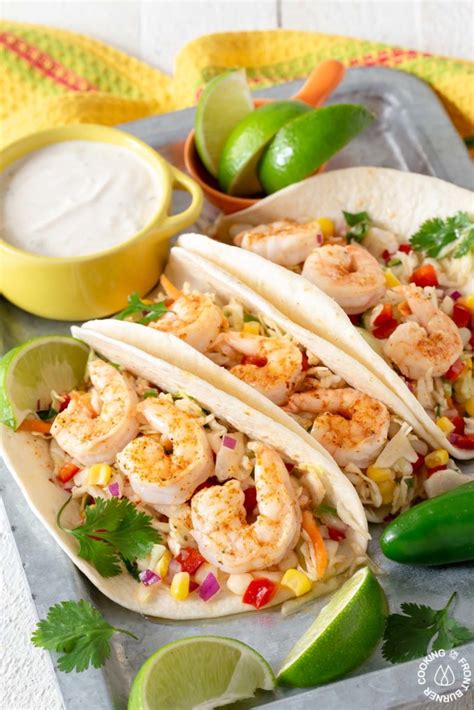 shrimp-tacos-with-spicy-coleslaw-cooking-on-the-front image