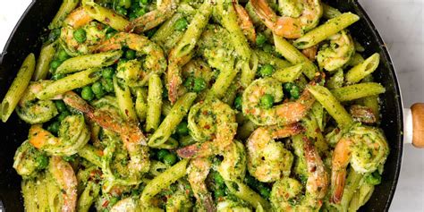 pesto-penne-with-shrimp-and-peas-delish image
