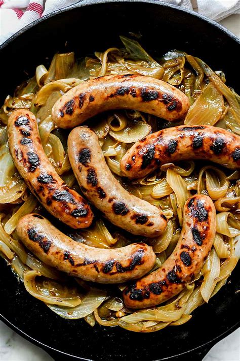 bratwurst-in-beer-with-onions-foodiecrushcom-food image