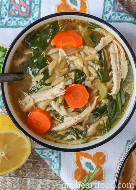 lemon-chicken-orzo-soup-with-spinach-girl-heart-food image