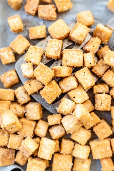 the-best-crispy-oven-baked-tofu-cubes-two-spoons image