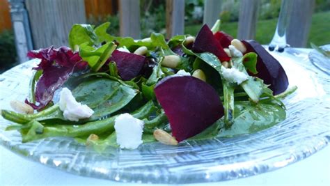 salad-with-beets-goat-cheese-and-pine-nuts image