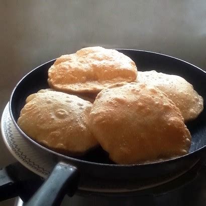 poori-indian-puffed-bread-tasty-kitchen-a-happy image