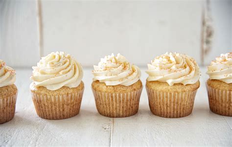 orange-sherbet-cupcakes-with-swiss-meringue image