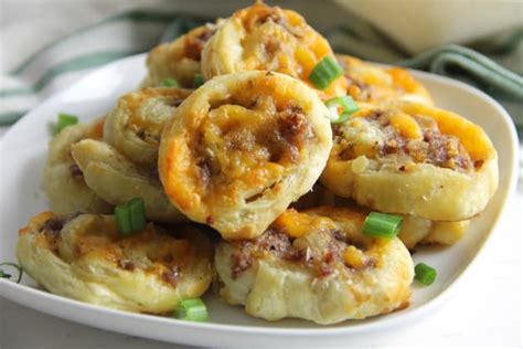 puff-pastry-sausage-cheddar-pinwheels-recipe-food image