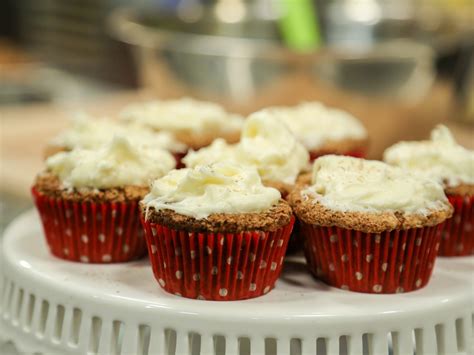 carrot-cupcakes-with-cream-cheese-frosting-food image