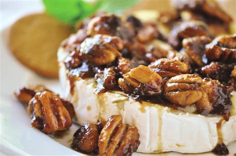 baked-brie-appetizer-with-pecans-candied-topping image