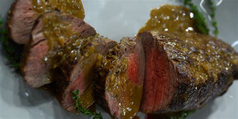 seared-beef-tenderloin-steak-with-black-pepper-pan image