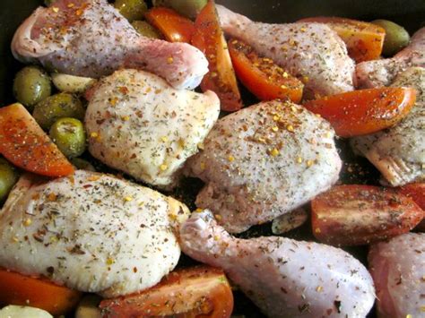 saucy-baked-chicken-legs-with-olives-and-tomatoes image
