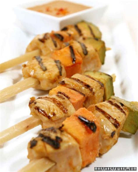 tropical-chicken-on-sugarcane-skewers-with-peanut image