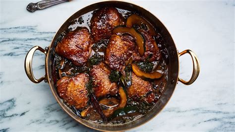 braised-chicken-thighs-with-squash-and-mustard-greens image