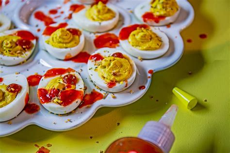 ghost-pepper-deviled-eggs-yellowbird-sauce image