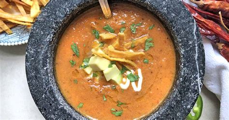 spicy-and-creamy-vegetarian-tortilla-soup-foodal image