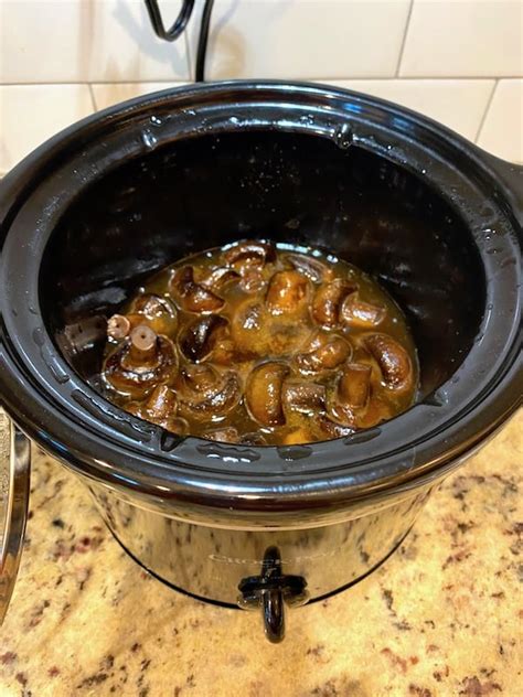 slow-cooker-marinated-mushrooms-southern-home image