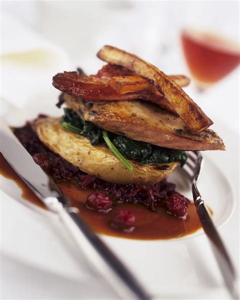 pheasant-on-braised-cabbage-with-roasted-vegetables image