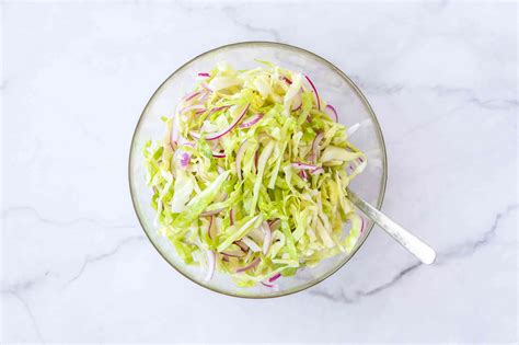 tangy-coleslaw-with-vinegar-dressing-recipe-the-spruce-eats image