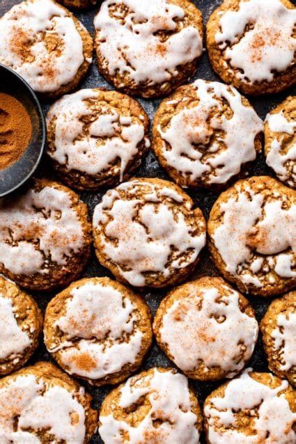 iced-gingerbread-oatmeal-cookies-sallys-baking image