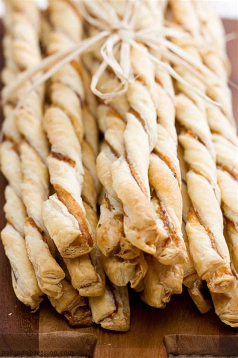 prosciutto-parmesan-puff-pastry-straws-baking image