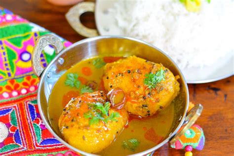 sweet-spicy-ripe-mango-curry-recipe-by-archanas image