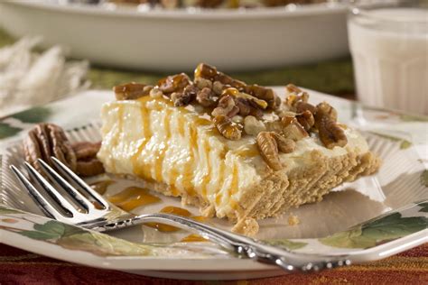 caramel-pecan-cheesecake-pie image