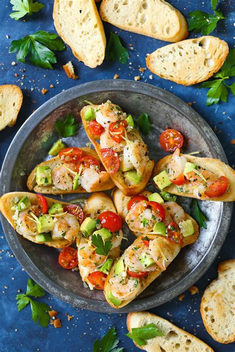 garlic-shrimp-and-avocado-crostini-damn-delicious image