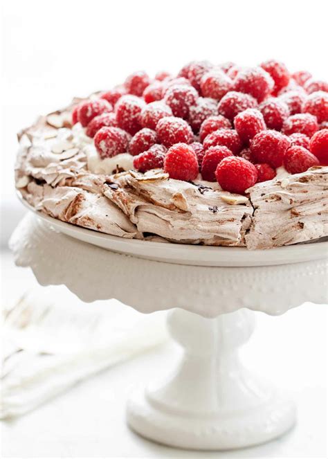 chocolate-pavlova-with-whipped-cream-and-raspberries image
