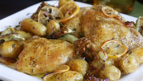 roast-chicken-thighs-with-potatoes-artichokes-lemon image