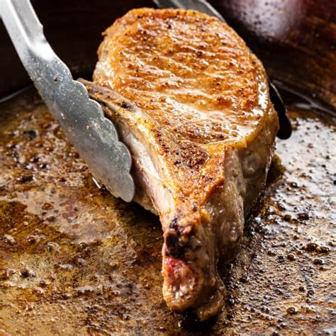 pan-seared-thick-cut-bone-in-pork-chops-for-two image