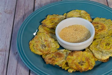 oven-fried-tostones-with-garlic-mojito-sauce-vegan image