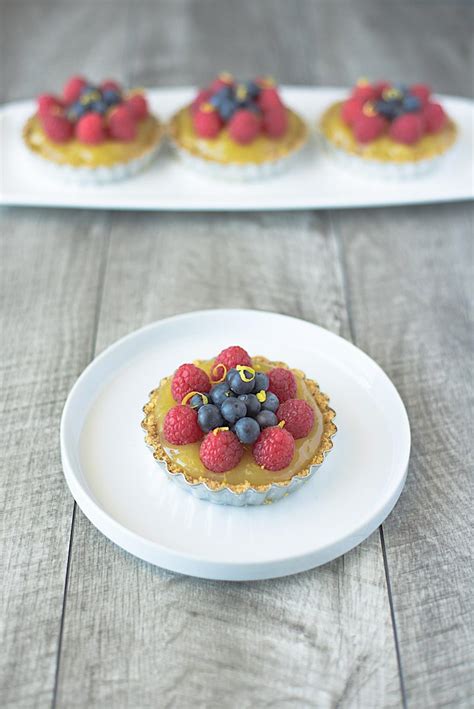 no-bake-berry-lemon-tartlets-culinary-ginger image